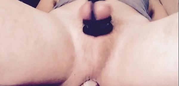  Teenage sissy in chastity plays with homemade toy to stretch his hole